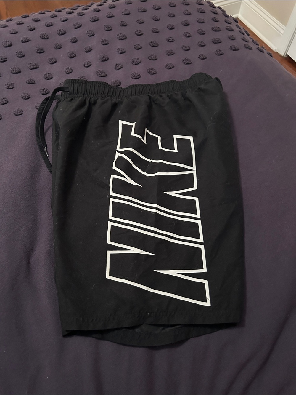 Nike Men’s Black swim Shorts with White Graphic Logo
